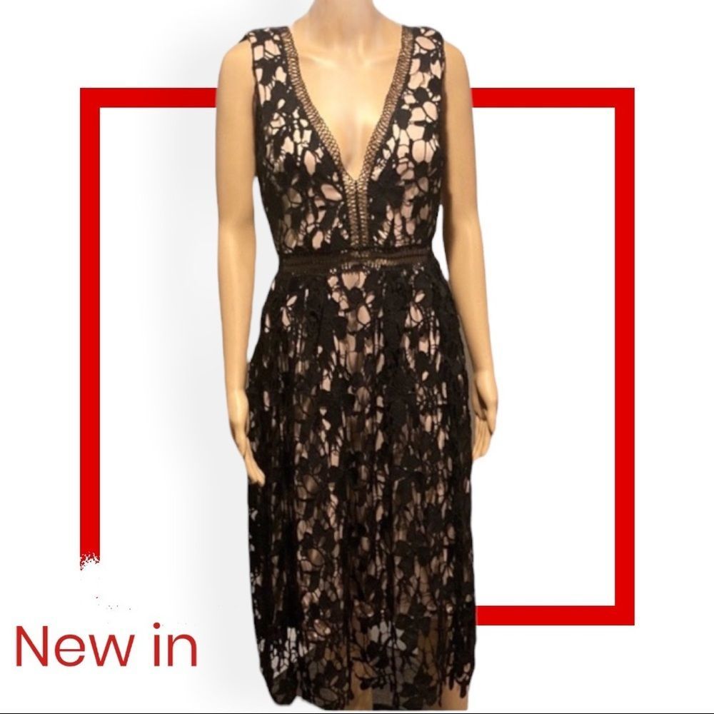 Aqua Black and Nude dress with floral lace and vneck and deep v in the back.